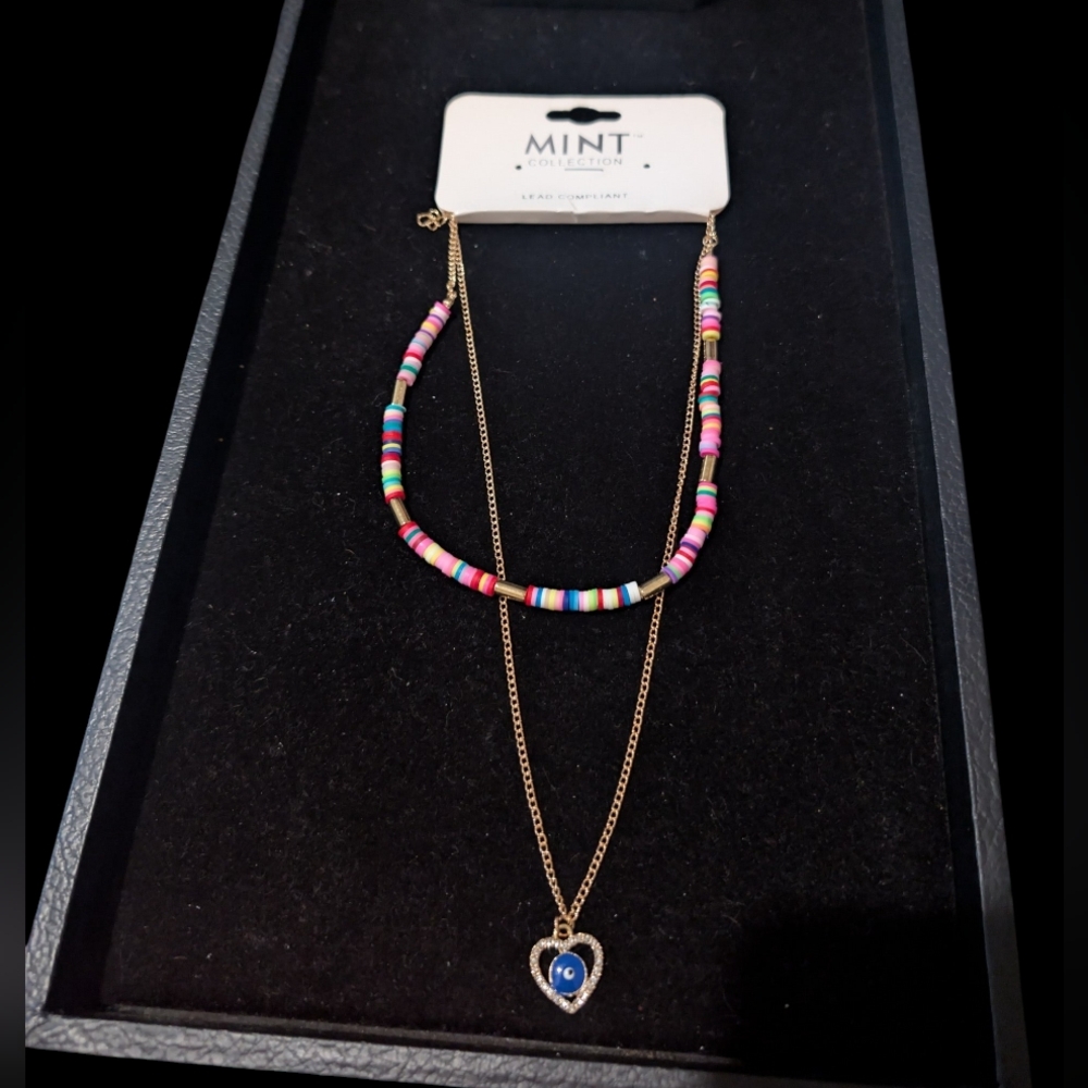 gold-toned layered necklace With Colorful beaded strands With A evil eye charm